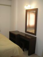 Pure Villa - Bed room with dressing table, and clothespress